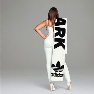 Large white faux fur scarf with black writing...